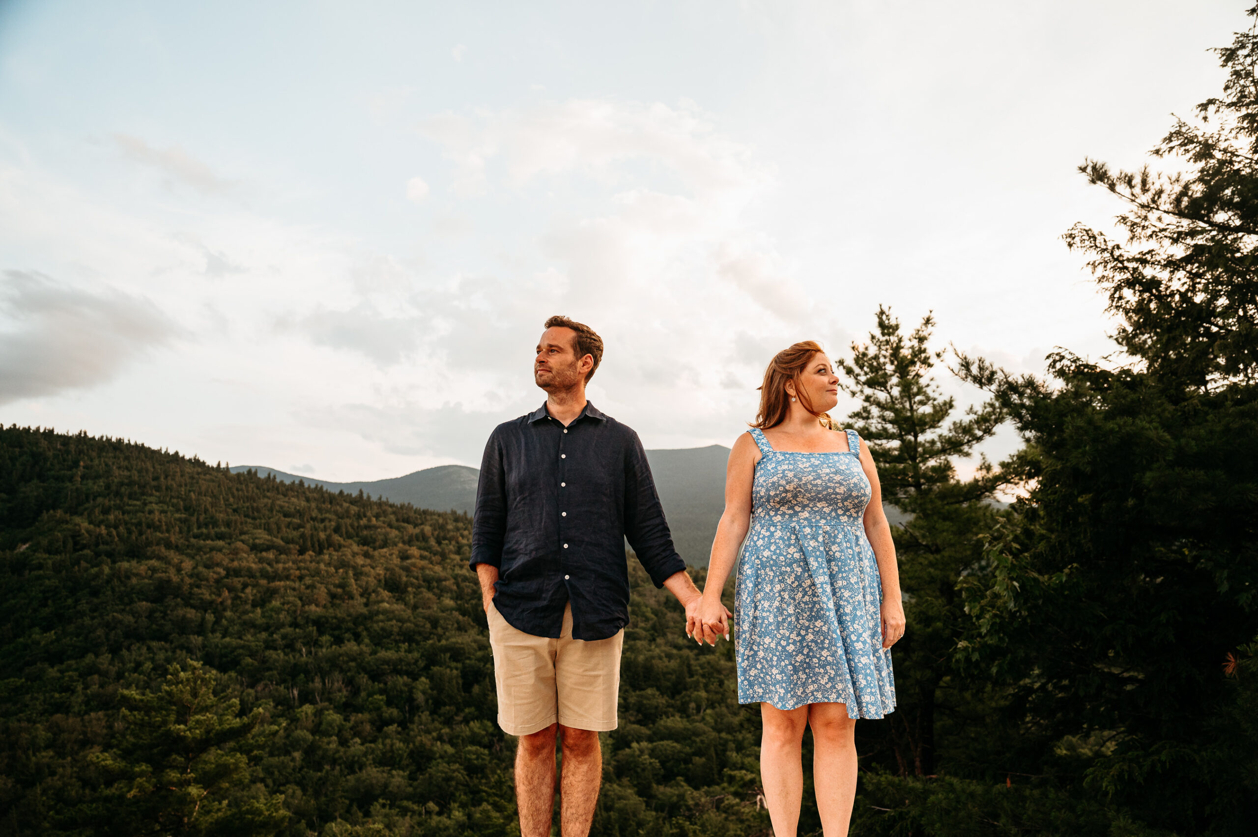 Romantic engagement photo overlooking Echo Lake and the Saco River Valley at Cathedral Ledge